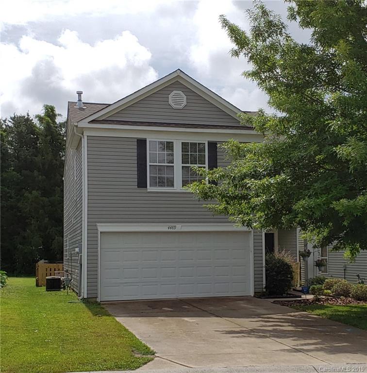4489 Norfleet Street Concord, NC 28025 - Photo 2 of 23 a front view of a house with a yard