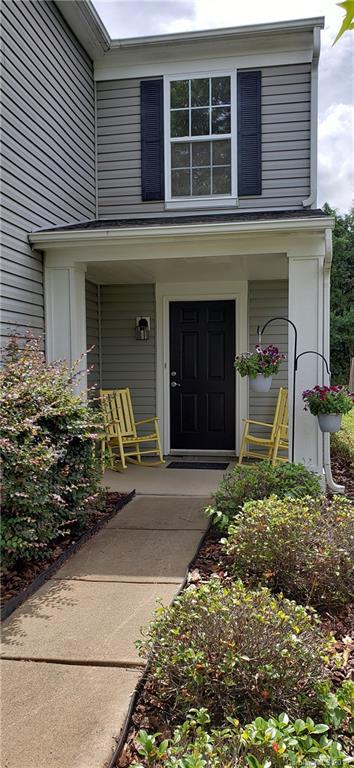 4489 Norfleet Street Concord, NC 28025 - Photo 3 of 23 a front view of a house with garden