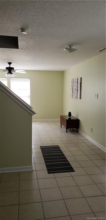4489 Norfleet Street Concord, NC 28025 - Photo 5 of 23 a kitchen with a sink and cabinets