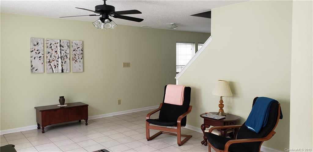 4489 Norfleet Street Concord, NC 28025 - Photo 6 of 23 a view of a workspace with furniture and a window