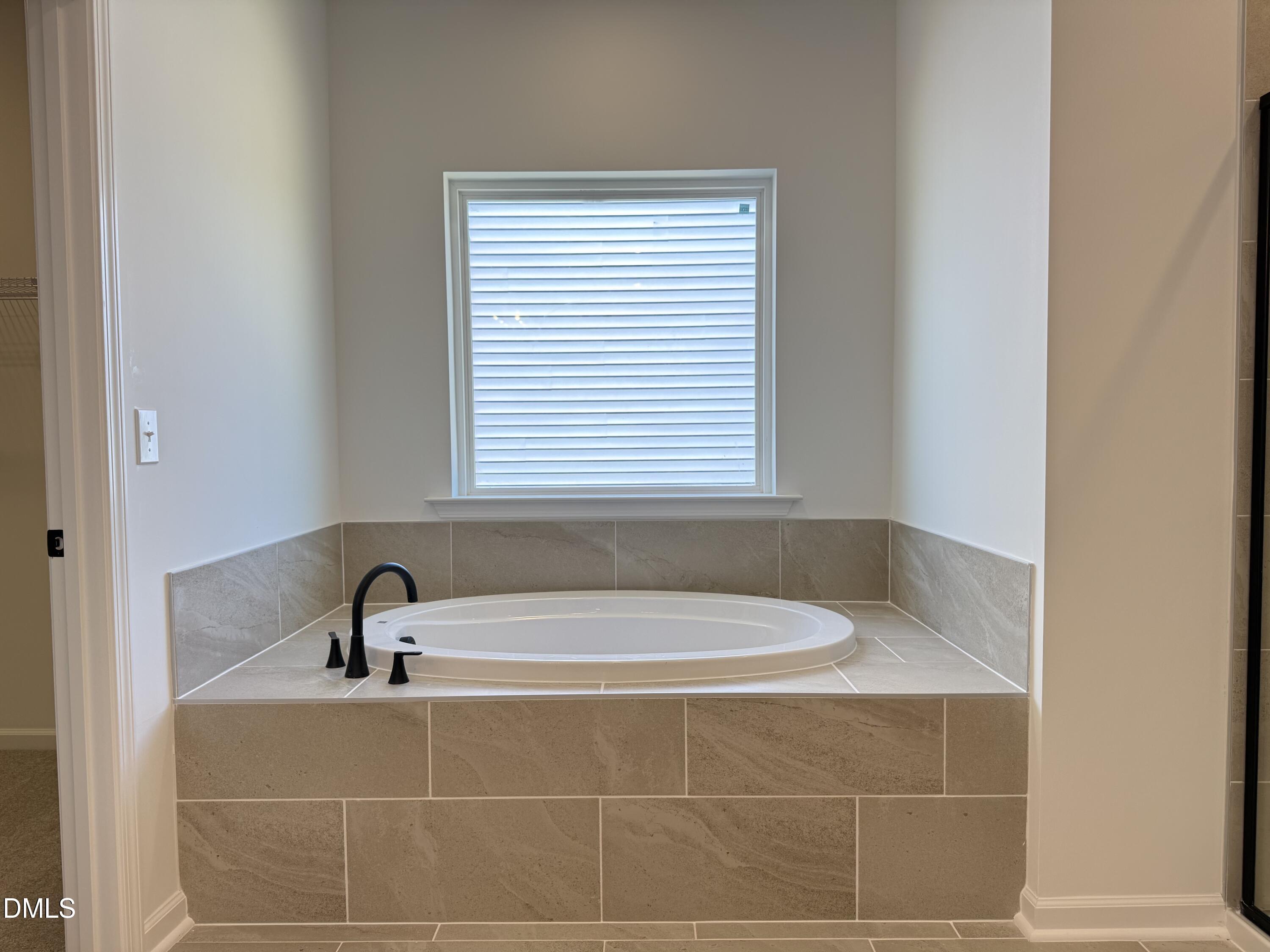 433 Contempo Court, Unit 3 Rolesville, NC 27571 - Photo 20 of 40 a bathroom with a bathtub