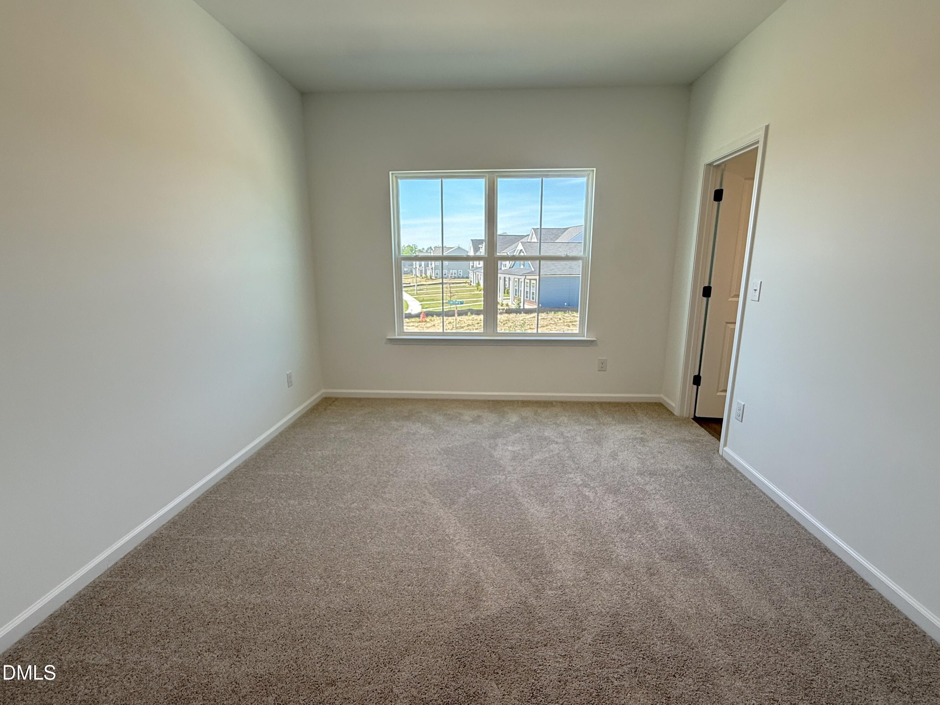 433 Contempo Court, Unit 3 Rolesville, NC 27571 - Photo 22 of 40 an empty room with a window