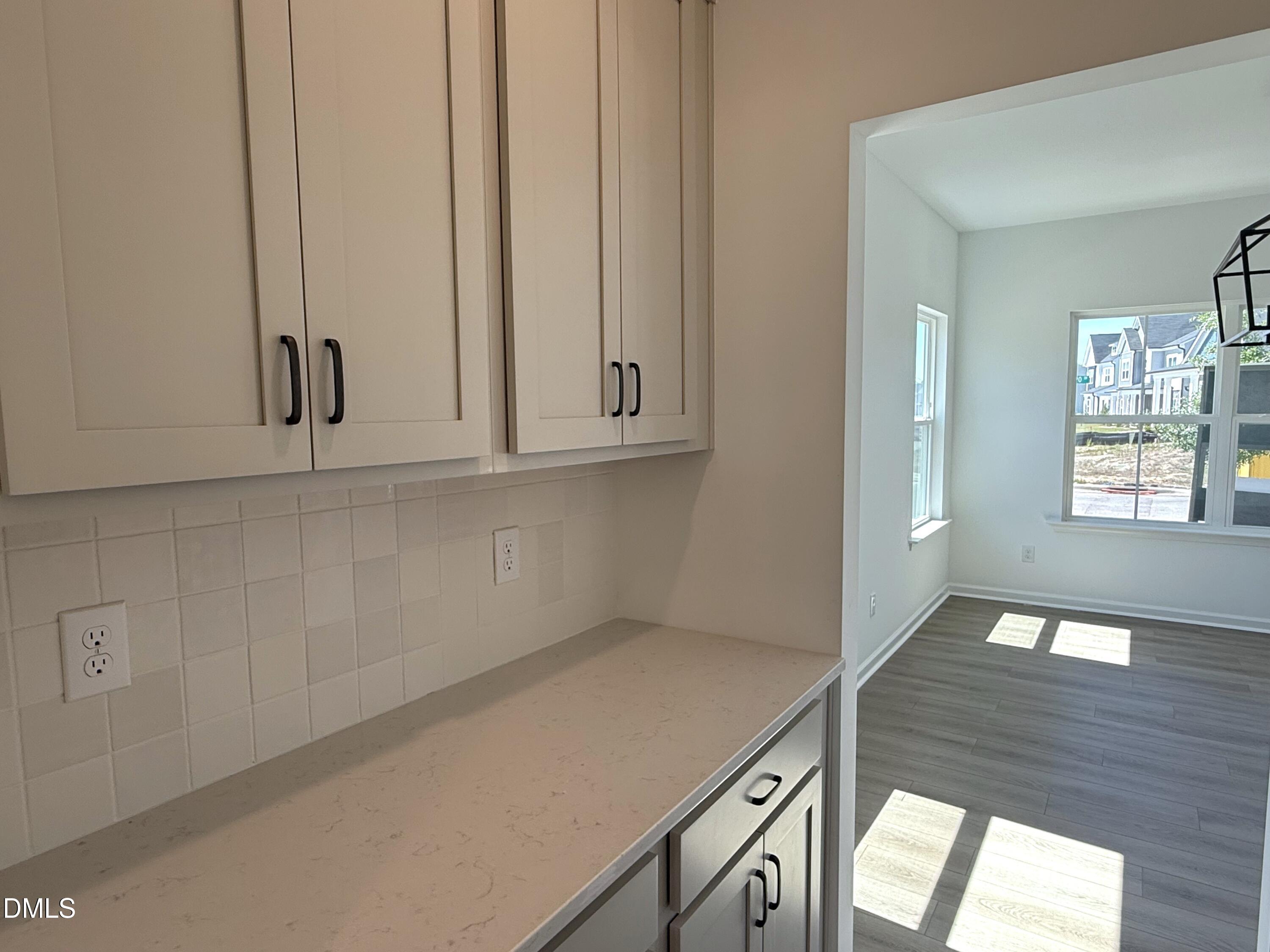 433 Contempo Court, Unit 3 Rolesville, NC 27571 - Photo 4 of 40 a view of an empty room and window