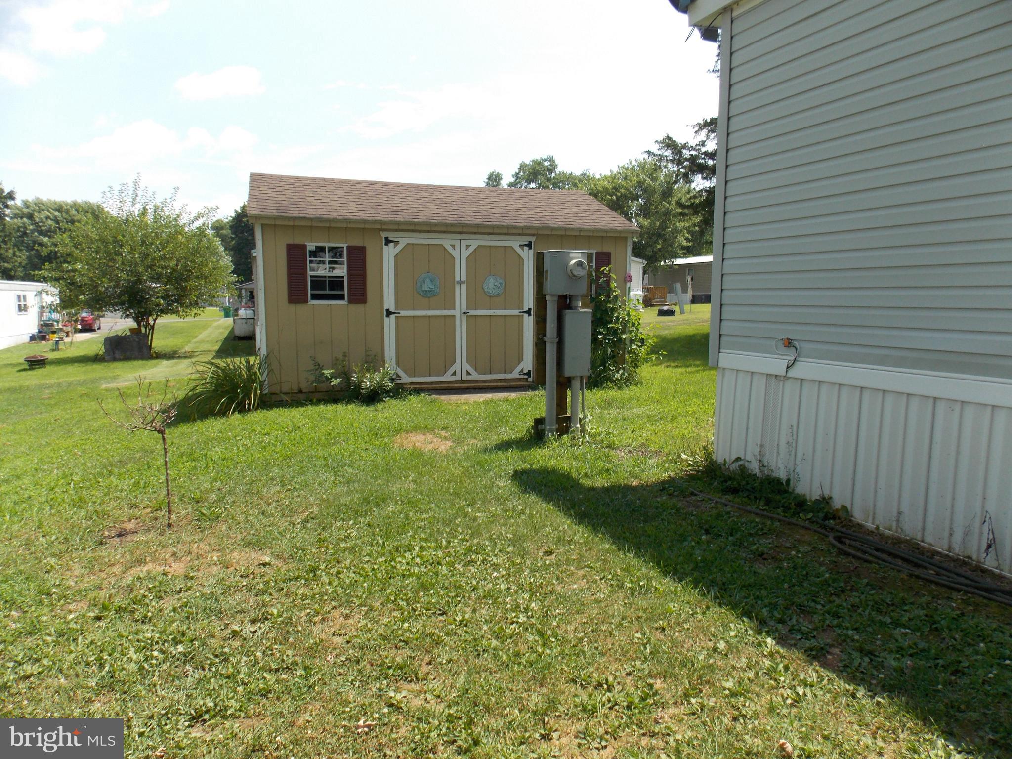 76 Big Spring Terrace Newville, PA 17241 - Photo 4 of 16 a view of a house with a backyard