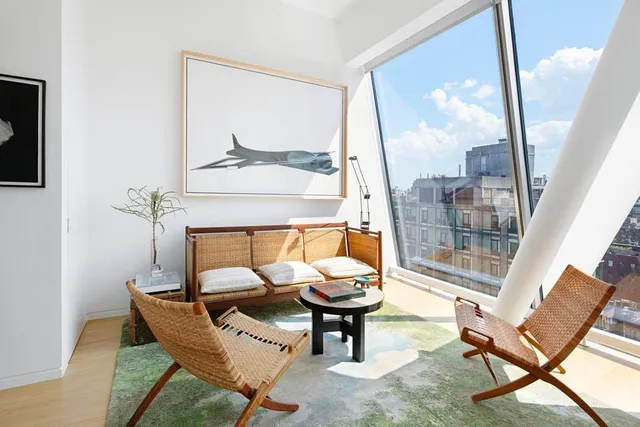 a living room with a couch and a table