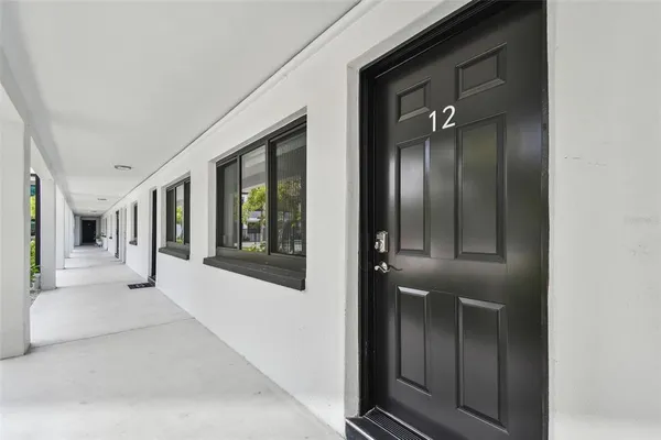a view of a hallway with interior of the house