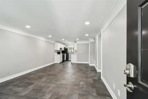 a view of a big room with wooden floors