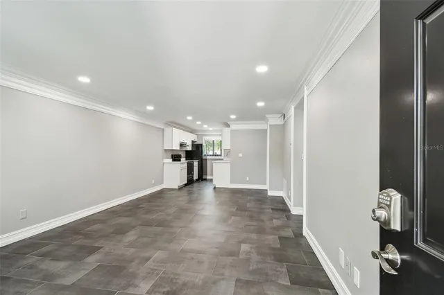 a view of a big room with wooden floors