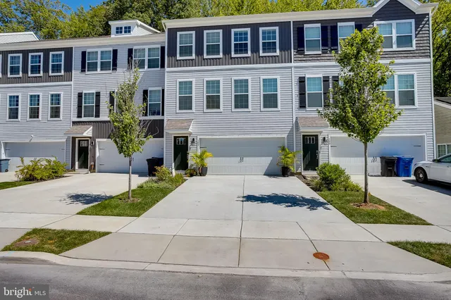 a front view of a house with yard
