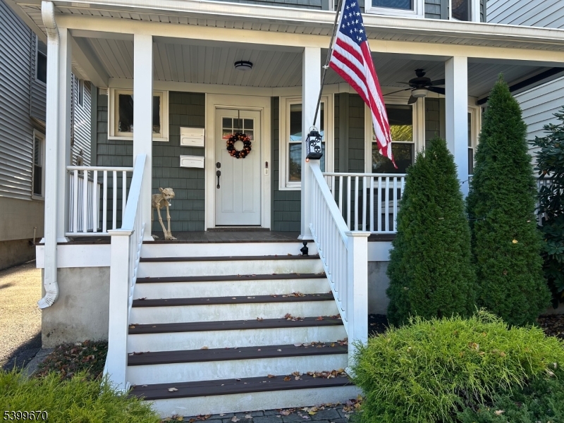 417 Valley Road Montclair, NJ 07043 - Photo 1 of 10 a view of a house with entryway and stairs