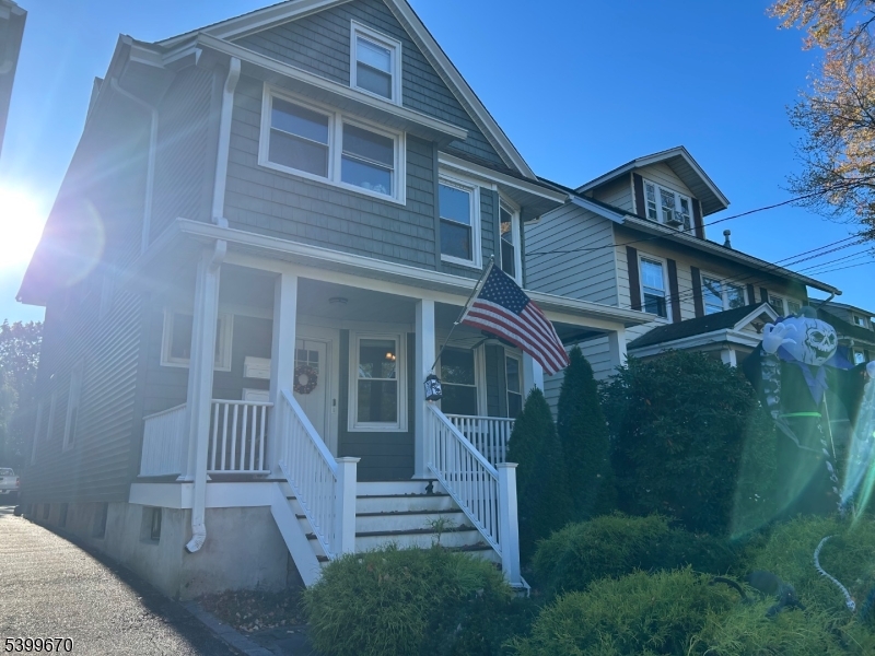 417 Valley Road Montclair, NJ 07043 - Photo 2 of 10 a view of a house with a yard