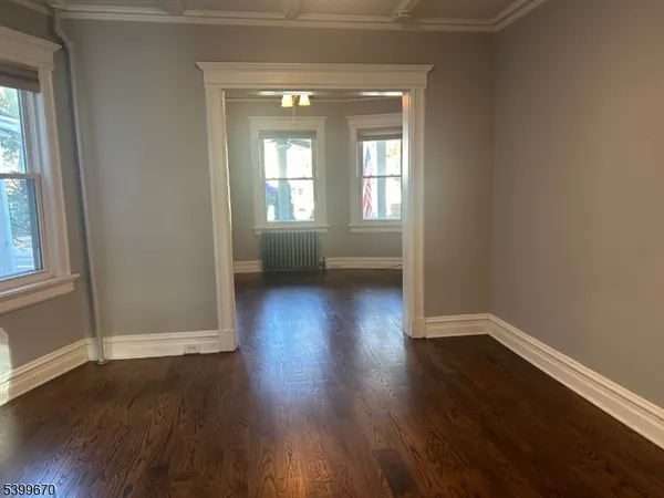 a view of livingroom with hardwood floor and window
