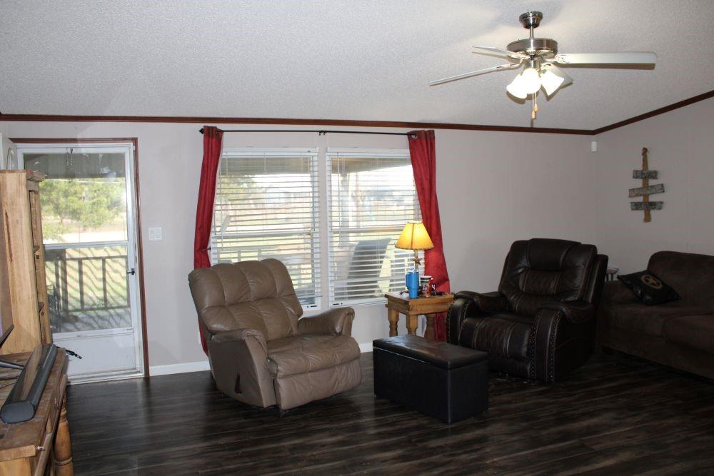10780 County Road 3707 Wills Point, TX 75169 - Photo 13 of 34 a living room with furniture and a window