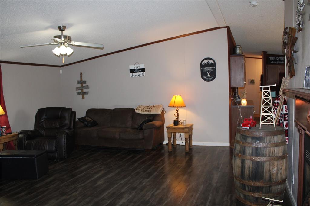 10780 County Road 3707 Wills Point, TX 75169 - Photo 14 of 34 a living room with furniture and wooden floor