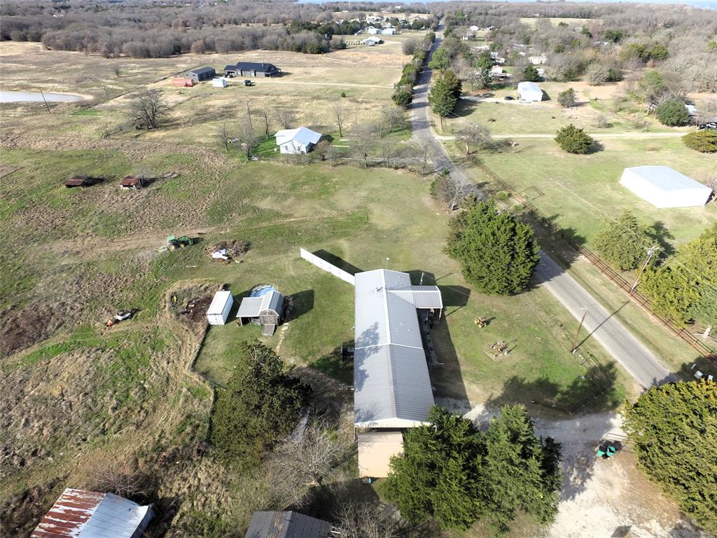 10780 County Road 3707 Wills Point, TX 75169 - Photo 34 of 34 an aerial view of residential houses with outdoor space