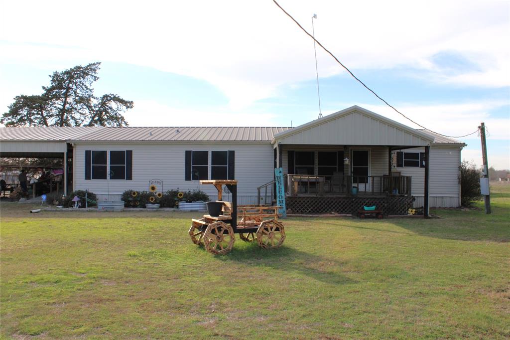 10780 County Road 3707 Wills Point, TX 75169 - Photo 5 of 34 a view of a house with swimming pool and porch