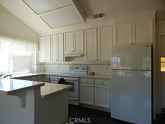 2905 Harden Avenue Corning, CA 96021 - Photo 2 of 26 a kitchen with a sink and cabinets