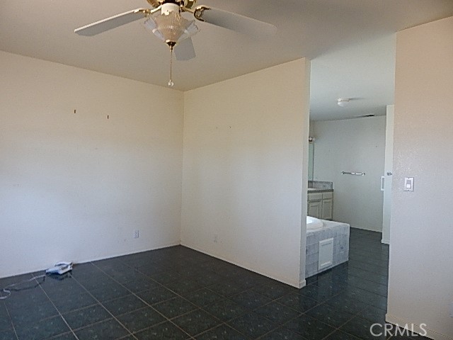 2905 Harden Avenue Corning, CA 96021 - Photo 6 of 26 a view of a room with wooden floor and white walls