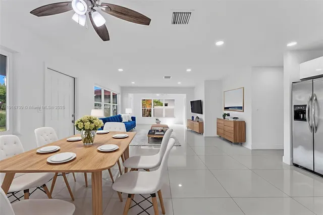 a view of a dining room with furniture