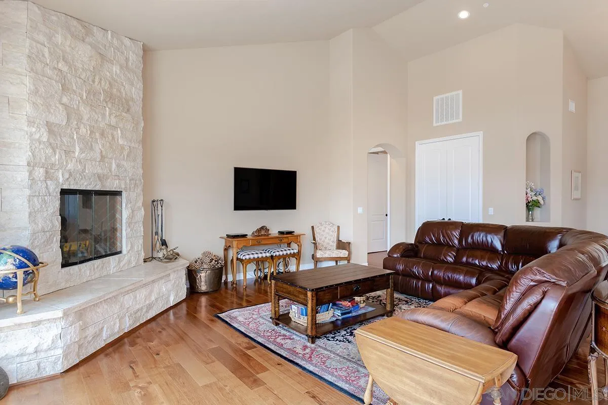 19840 7th Place Escondido, CA 92029 - Photo 11 of 49 a living room with furniture and a flat screen tv