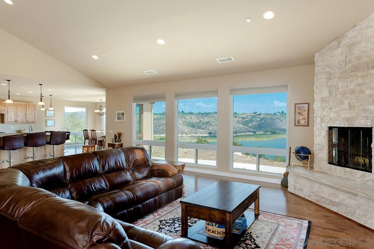 19840 7th Place Escondido, CA 92029 - Photo 2 of 49 a living room with furniture and a fireplace