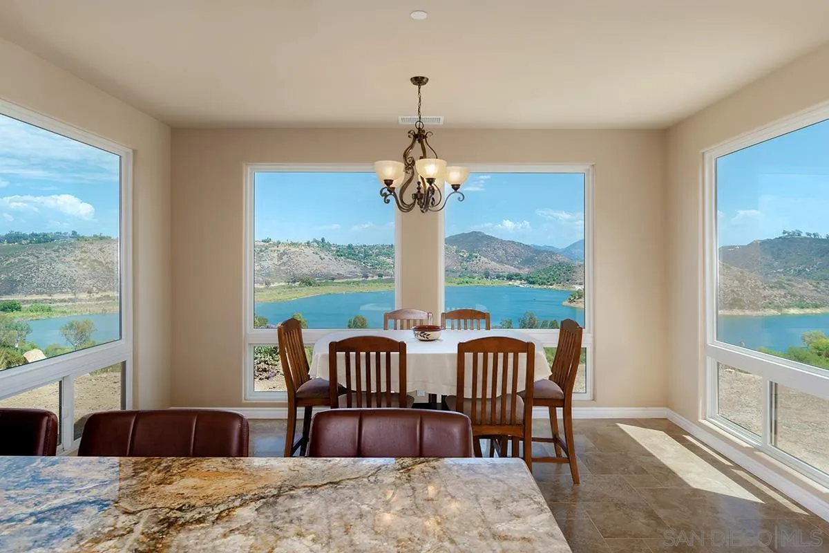 19840 7th Place Escondido, CA 92029 - Photo 22 of 49 a view of a dining room with furniture windows and wooden floor