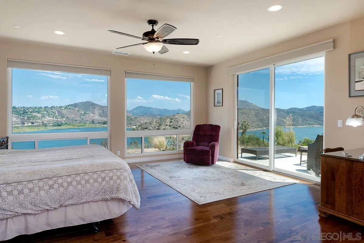 19840 7th Place Escondido, CA 92029 - Photo 24 of 49 a living room with couch tv and a large window