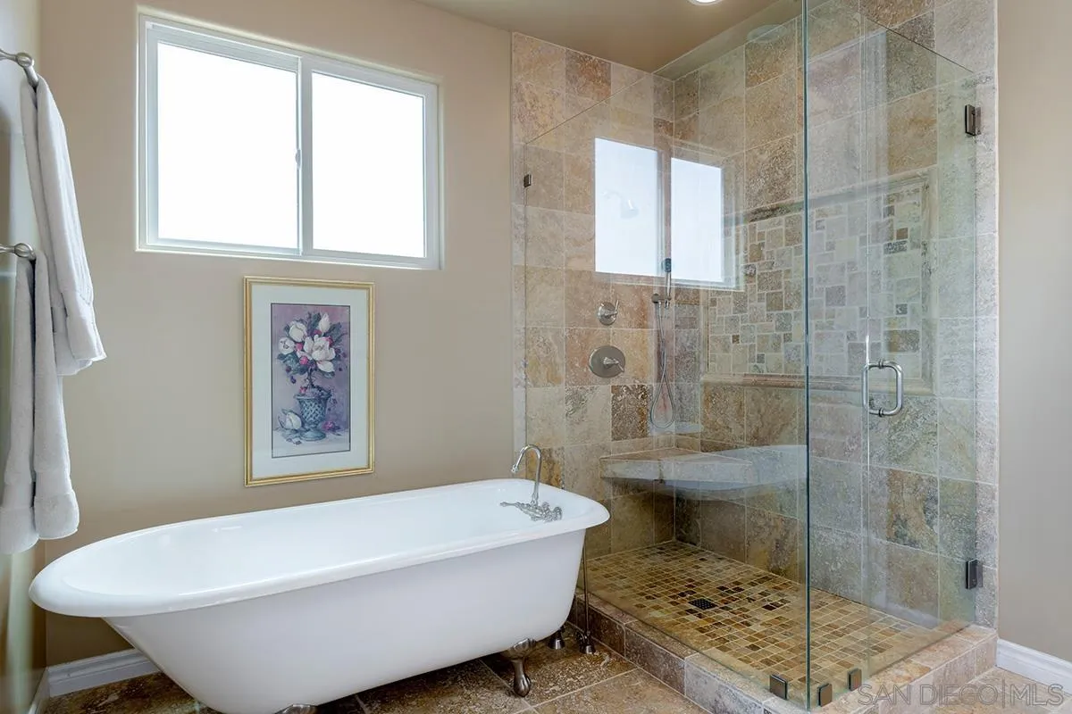 19840 7th Place Escondido, CA 92029 - Photo 31 of 49 a bathroom with a bathtub and shower