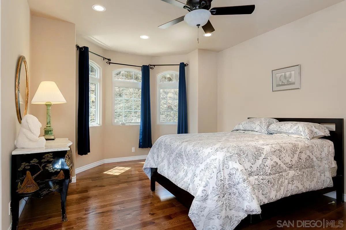 19840 7th Place Escondido, CA 92029 - Photo 33 of 49 a bedroom with a large bed and a window