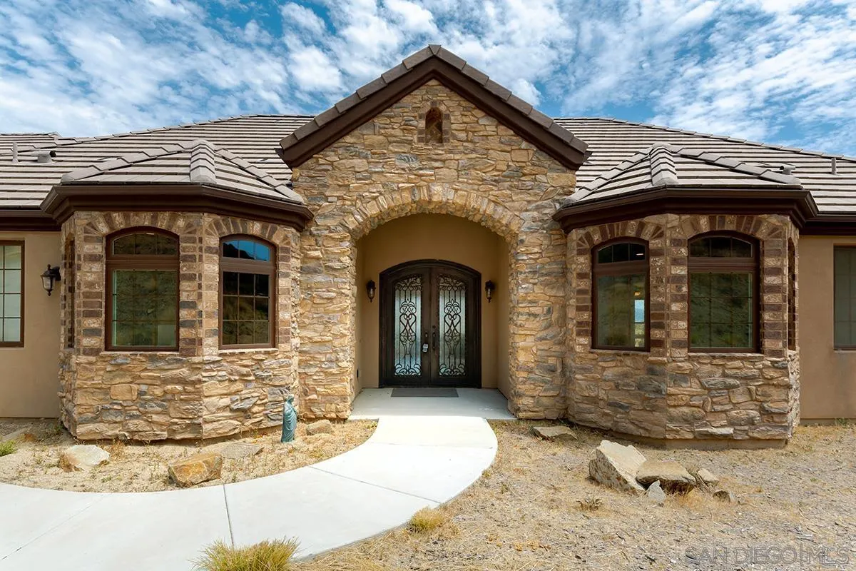 19840 7th Place Escondido, CA 92029 - Photo 4 of 49 a view of building with glass door