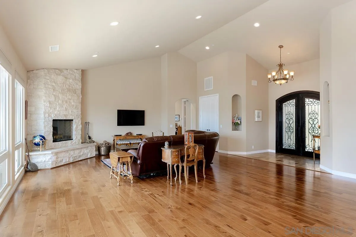 19840 7th Place Escondido, CA 92029 - Photo 6 of 49 a living room with furniture and a flat screen tv