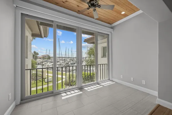 an open kitchen with a sink and dish washer