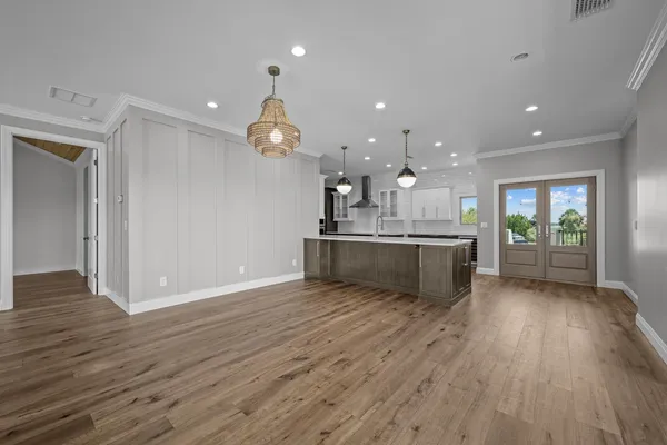 a view of a livingroom with wooden floor