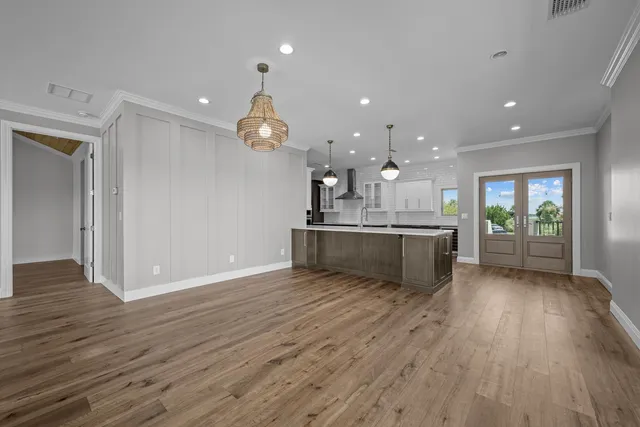 a view of a livingroom with wooden floor