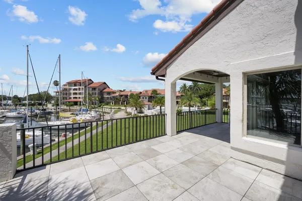 a view of a swimming pool with a yard