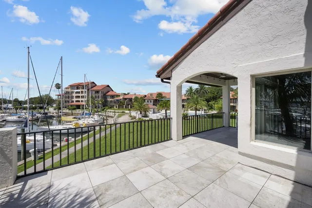 a view of a swimming pool with a yard
