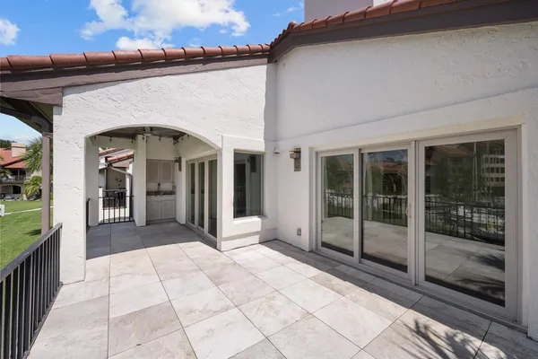 a very nice looking room with a large window and chandelier
