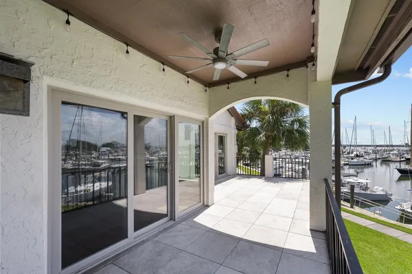 an aerial view of residential houses with outdoor space and street view