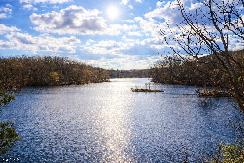 8 Cub Lake Road Andover, NJ 07821 - Photo 4 of 14 a view of a lake with houses