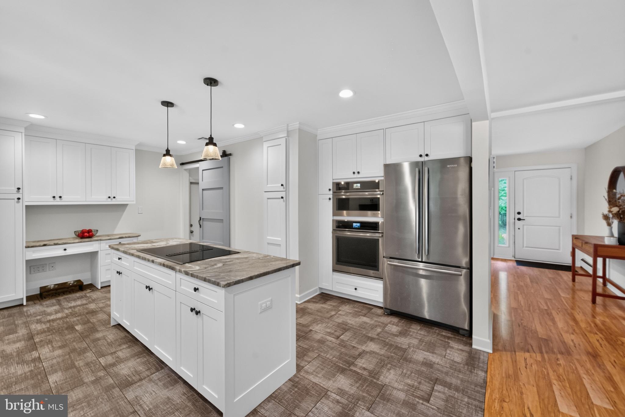 338 Woolf Road Milford, NJ 08848 - Photo 5 of 24 Modern kitchen with sleek finishes.
