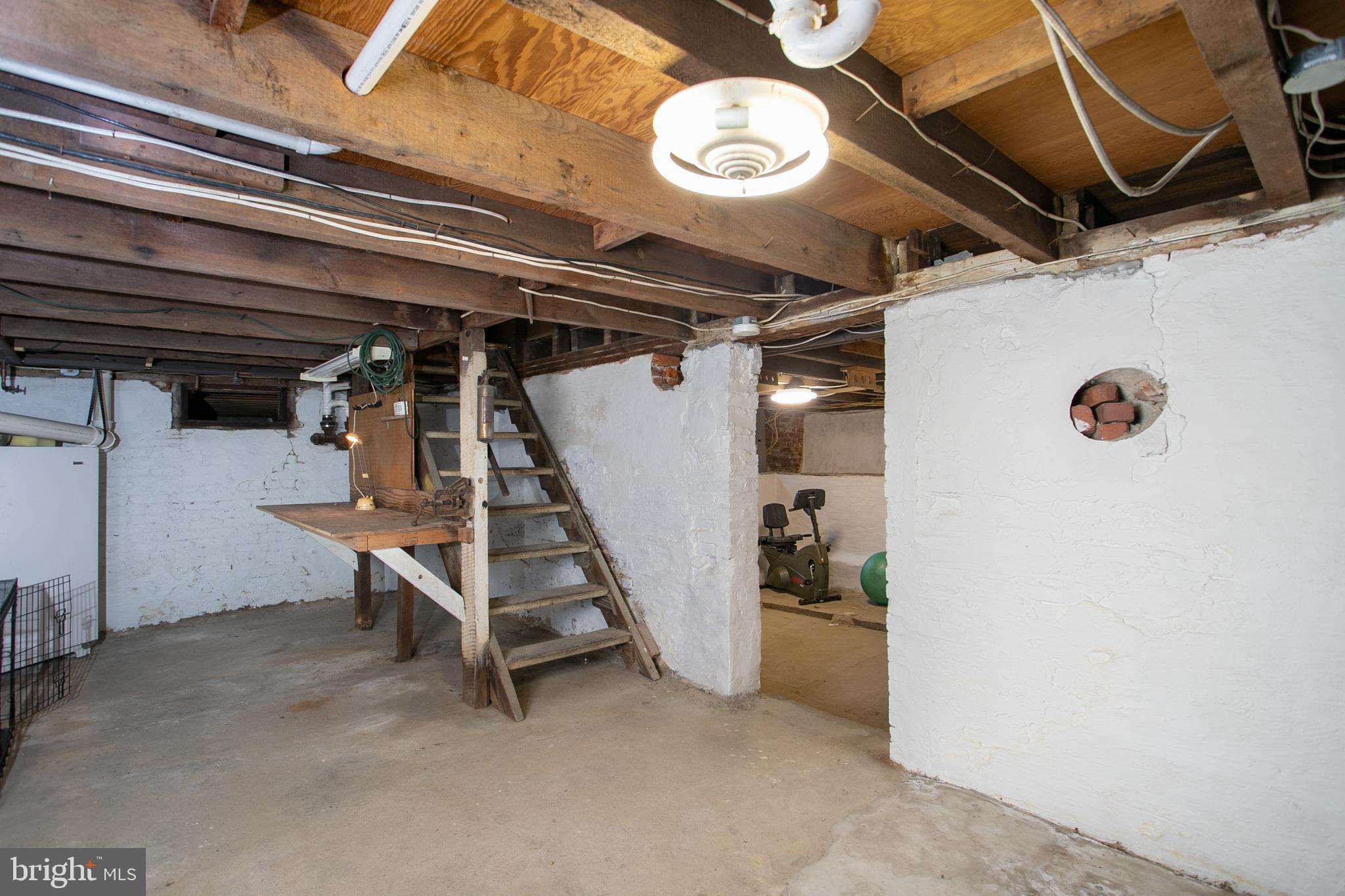 146 Wrightstown Cookstown Road Cookstown, NJ 08511 - Photo 32 of 40 Basement with workbench table