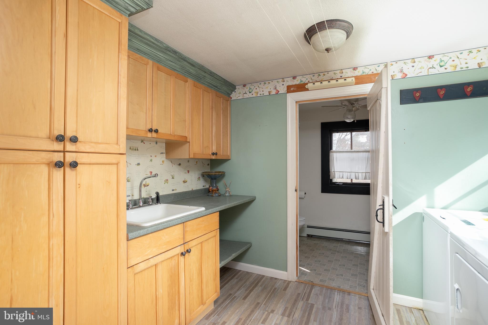 146 Wrightstown Cookstown Road Cookstown, NJ 08511 - Photo 9 of 40 Laundry room will storage space