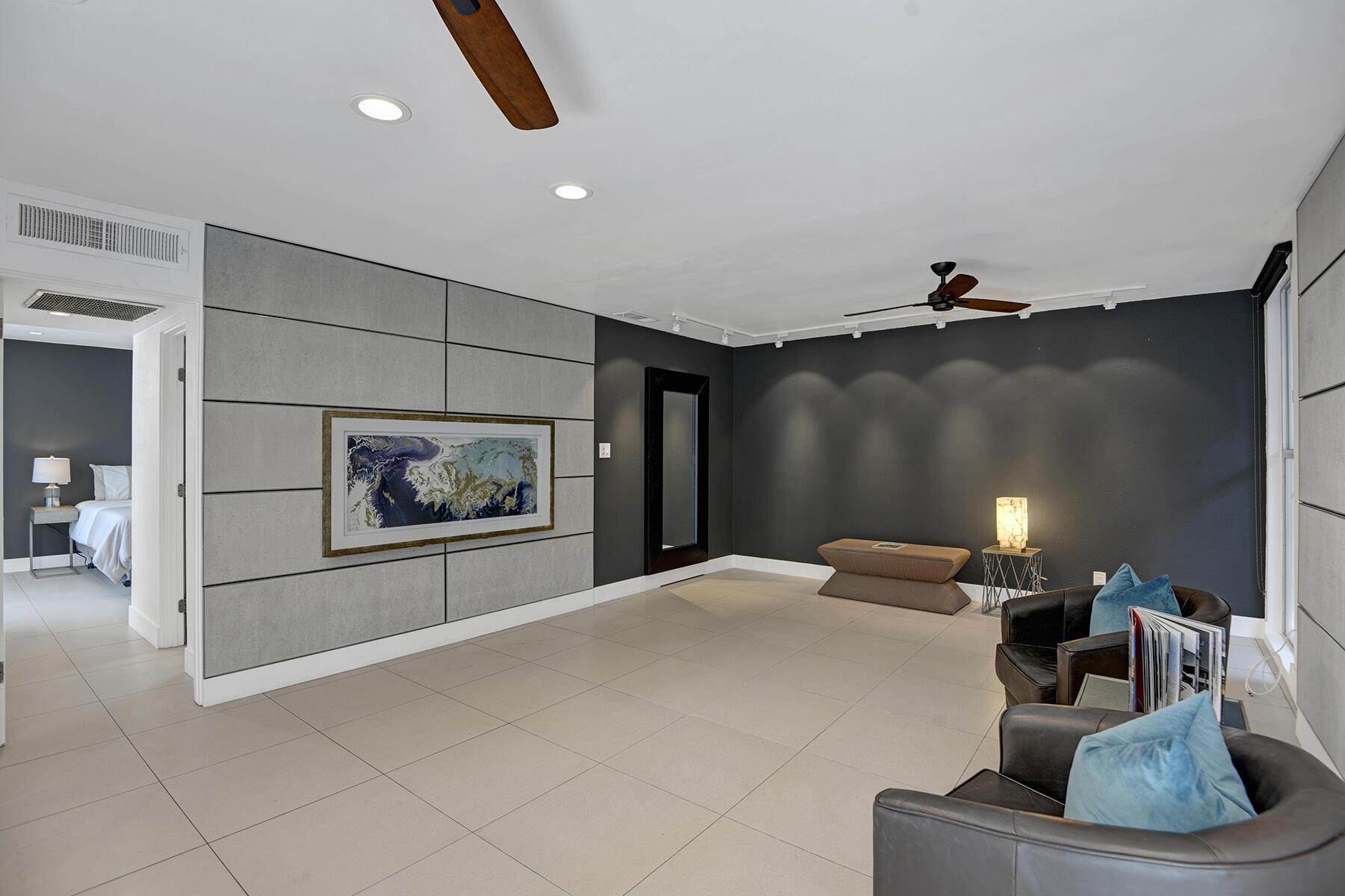 a bedroom with a bed and bathroom