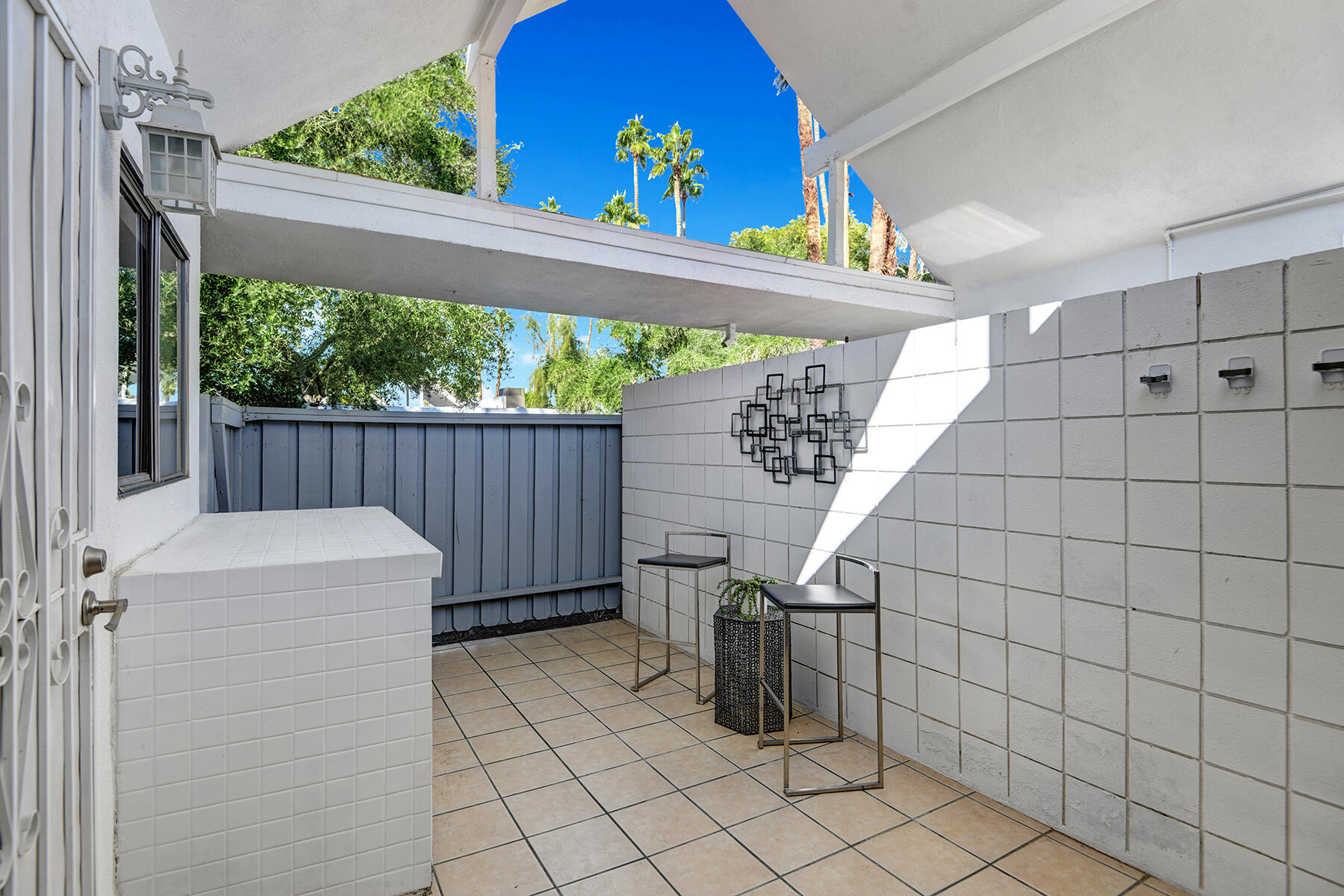 42379 Rancho Las Palmas Drive, Unit 29 Rancho Mirage, CA 92270 - Photo 17 of 24 a view of a porch with furniture