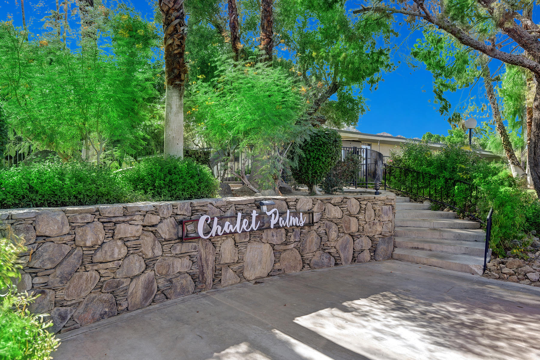 42379 Rancho Las Palmas Drive, Unit 29 Rancho Mirage, CA 92270 - Photo 24 of 24 a view of a bench in a yard