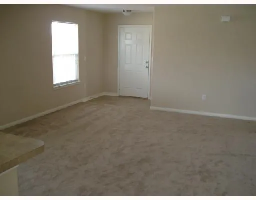 a view of a window in an empty room