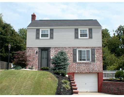 831 Rolling Rock Road Pittsburgh, PA 15234 - Photo 1 of 16 Exterior Front. Great curb appeal. New retaining walls along driveway. New siding, shutters, front door 2009.