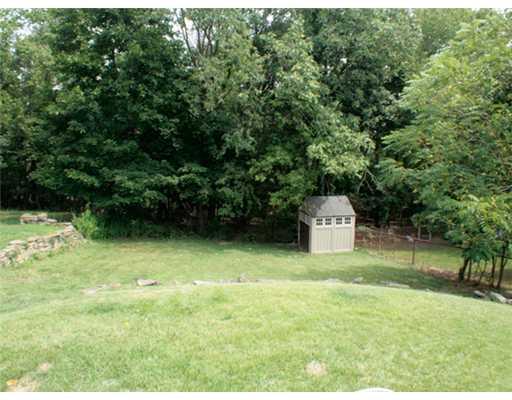 831 Rolling Rock Road Pittsburgh, PA 15234 - Photo 15 of 16 Yard/Garden. Usable back yard with woods behind for privacy. Shed included.