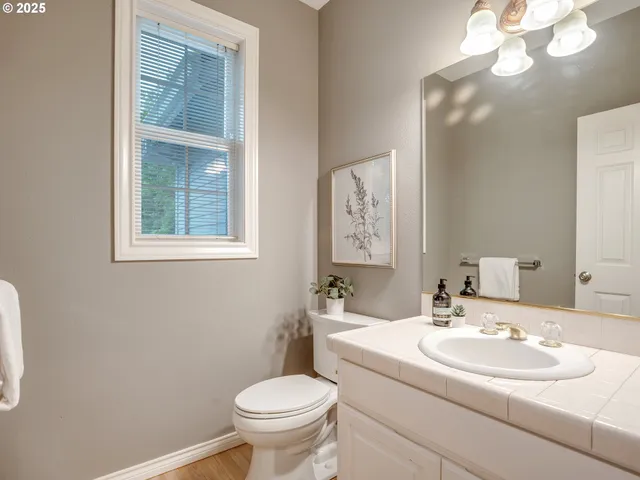a view of living room with furniture and fireplace