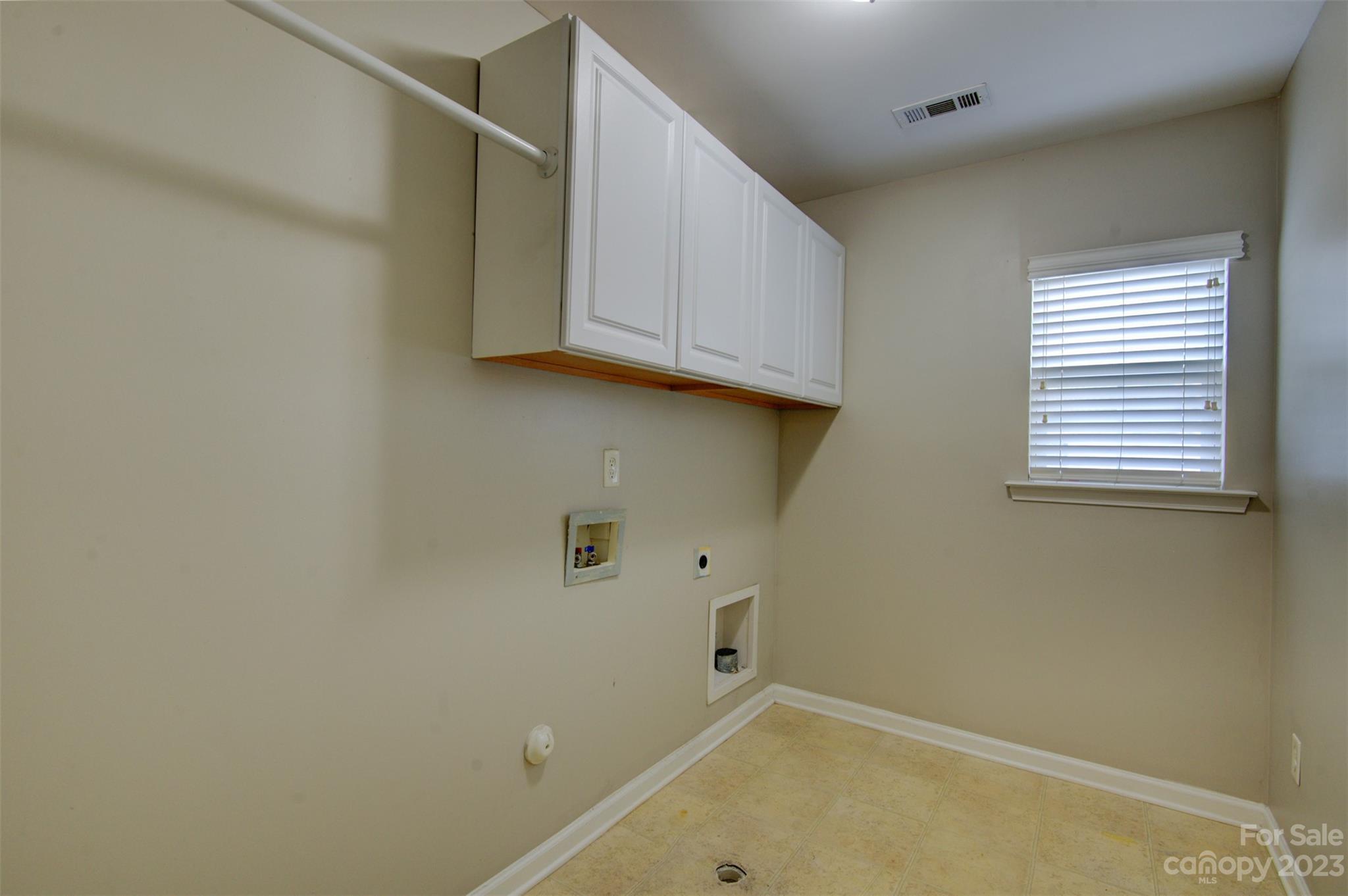 9201 Seamill Road Charlotte, NC 28278 - Photo 11 of 23 a view of a room that has a window and cabinets